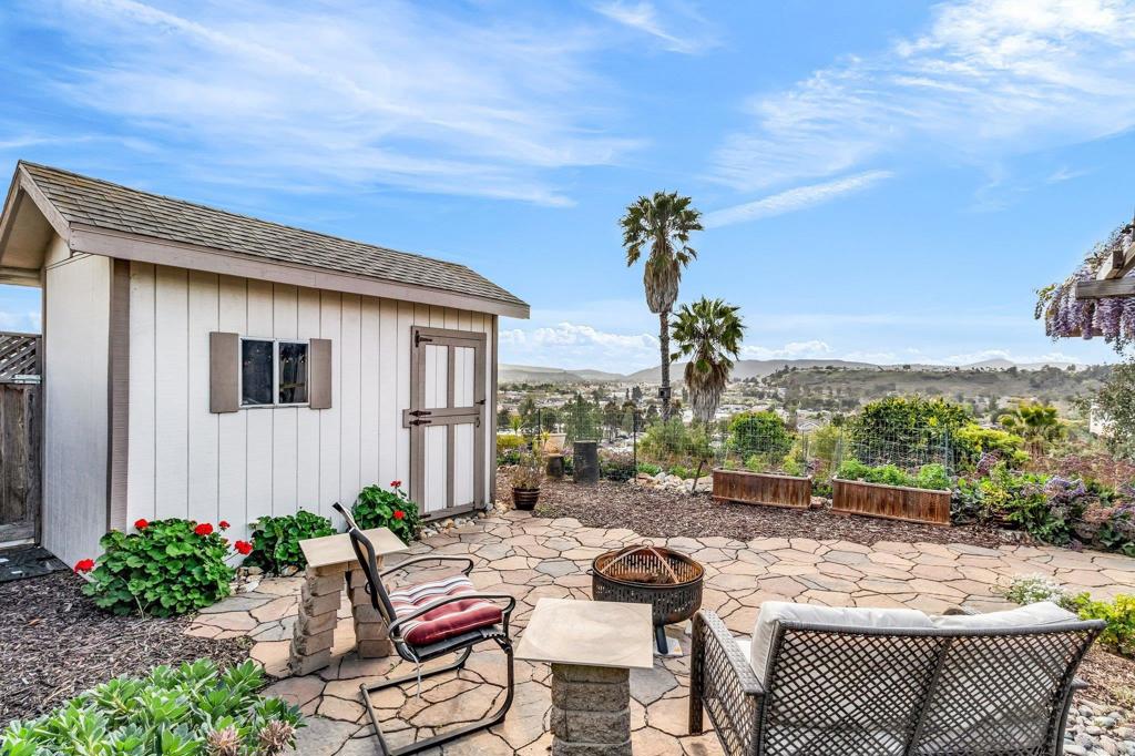 13501 Melissa Lane Poway, CA 92064 - Photo 51 of 62 a view of a patio with couches table and chairs and potted plants