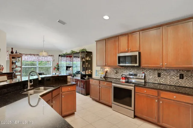 a view of a dining room with furniture