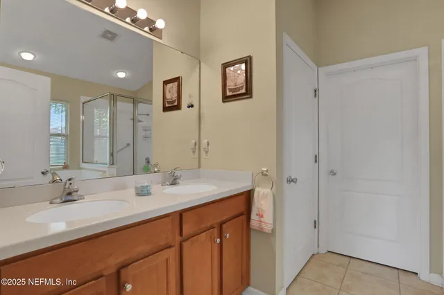 a bathroom with a bathtub and window