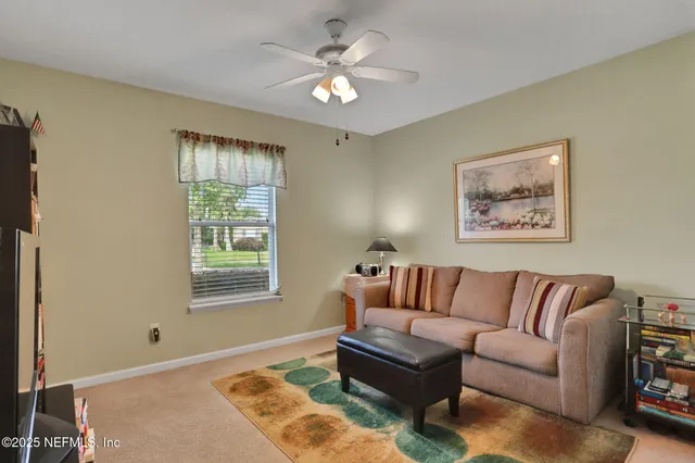 a living room with furniture and a couch