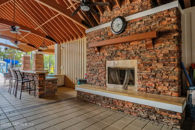 an aerial view of a house having patio