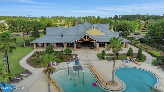 a view of a swimming pool with a sitting space