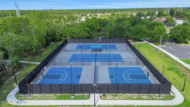 a view of a swimming pool with a patio