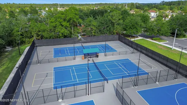 a view of a swimming pool with a patio