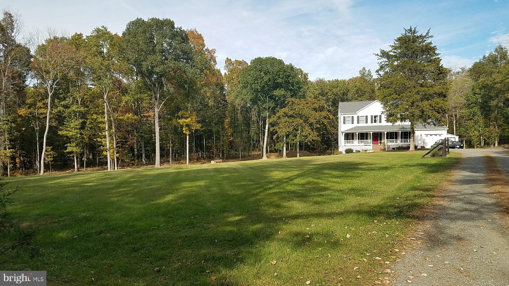 Huge front yard and long driveway