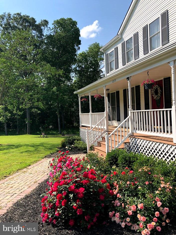 View  of the front flowerbed from the driveway