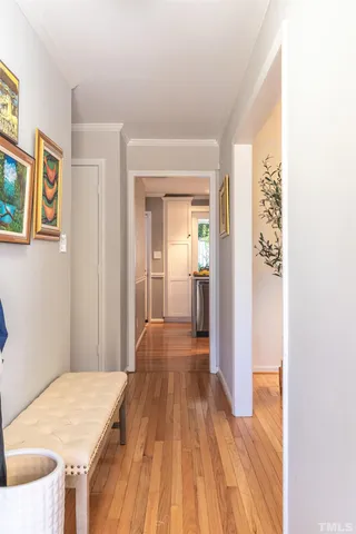 a bedroom with a bed and a table in it