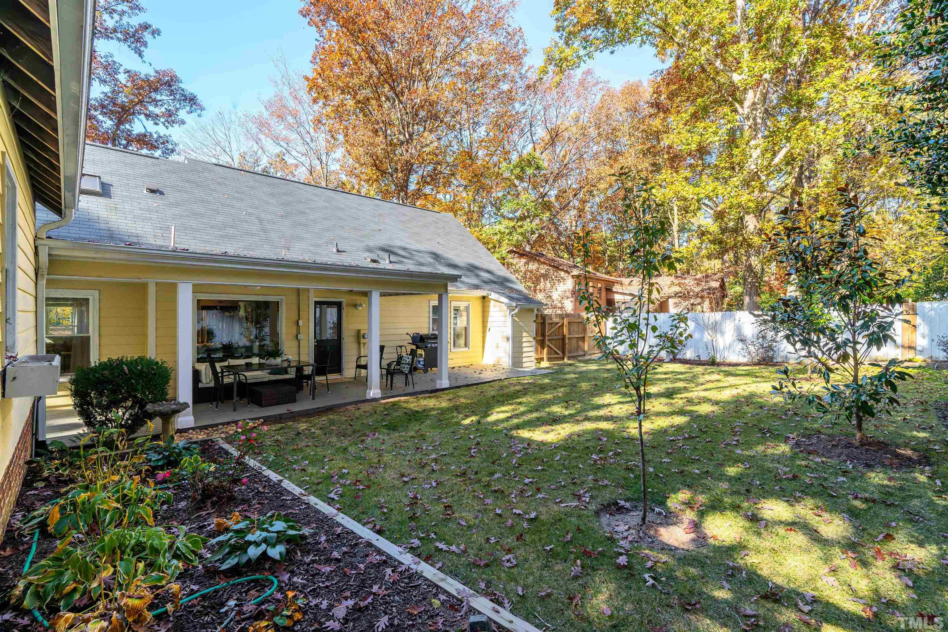 7304 Ray Road Raleigh, NC 27613 - Photo 28 of 30 a view of a house with backyard