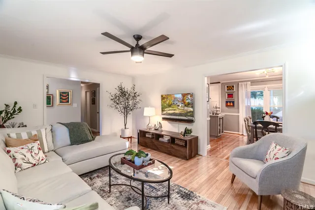 a living room with furniture a fireplace