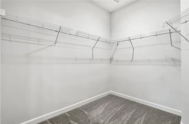 a view of a room with racks on the wall