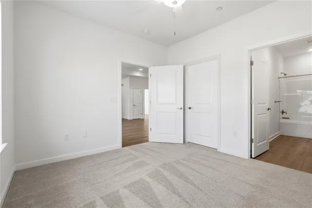 a view of a bathroom with a sink and a shower