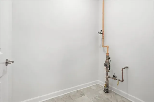 a view of a house with a snow in the yard