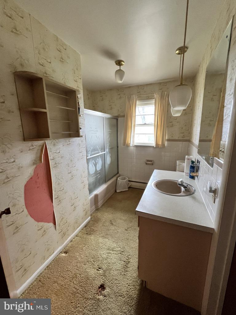 977 Locust Grove Road Middletown, PA 17057 - Photo 12 of 30 a bathroom with a sink and a mirror
