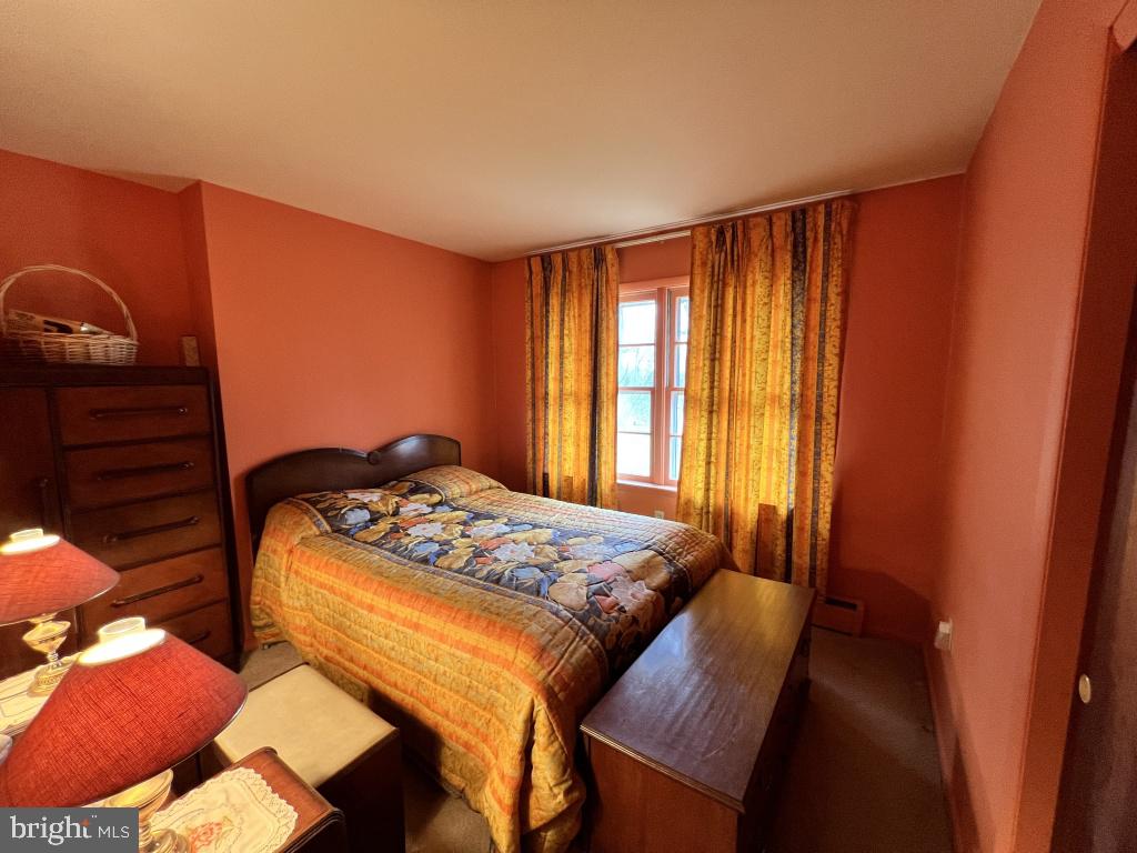 977 Locust Grove Road Middletown, PA 17057 - Photo 14 of 30 a bedroom with a bed and a window