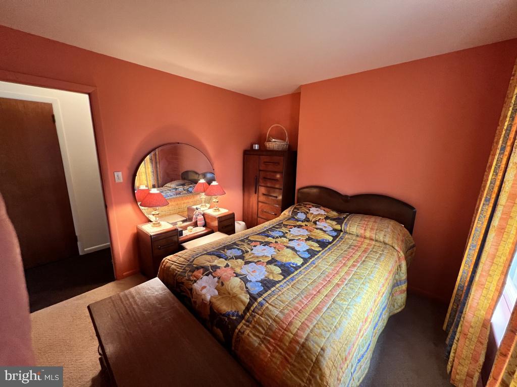 977 Locust Grove Road Middletown, PA 17057 - Photo 15 of 30 a bedroom with bed and a large window