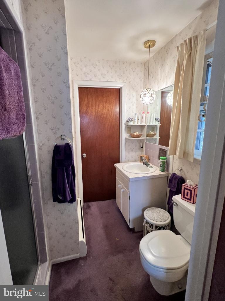 977 Locust Grove Road Middletown, PA 17057 - Photo 18 of 30 a bathroom with a sink toilet and shower