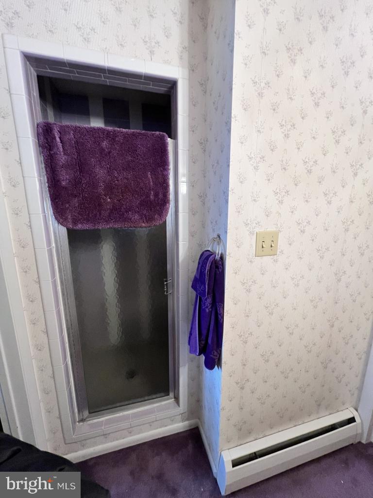 977 Locust Grove Road Middletown, PA 17057 - Photo 19 of 30 a glass door with a shower