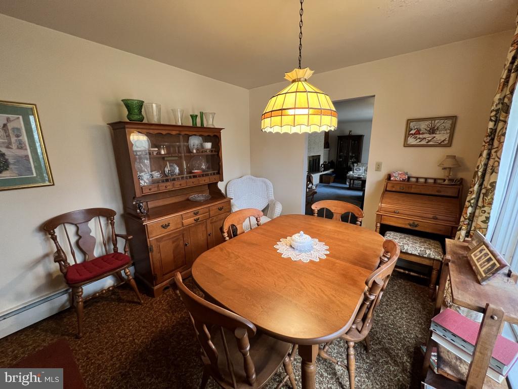 977 Locust Grove Road Middletown, PA 17057 - Photo 21 of 30 a view of a dining room with furniture