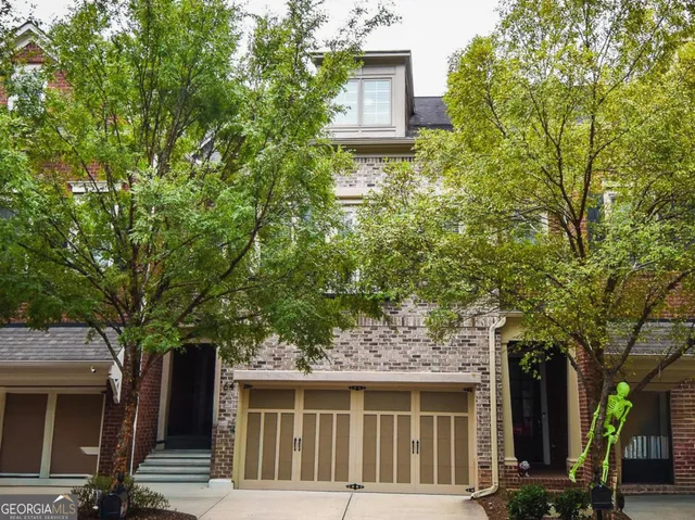 a front view of a house with stairs
