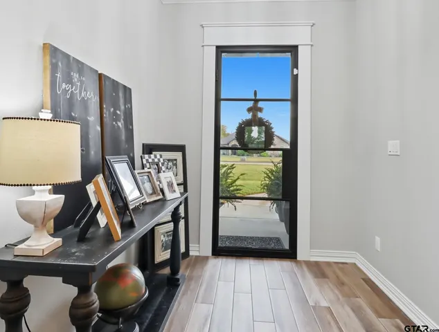 a view of workspace with wooden floor