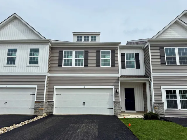 a front view of house with yard