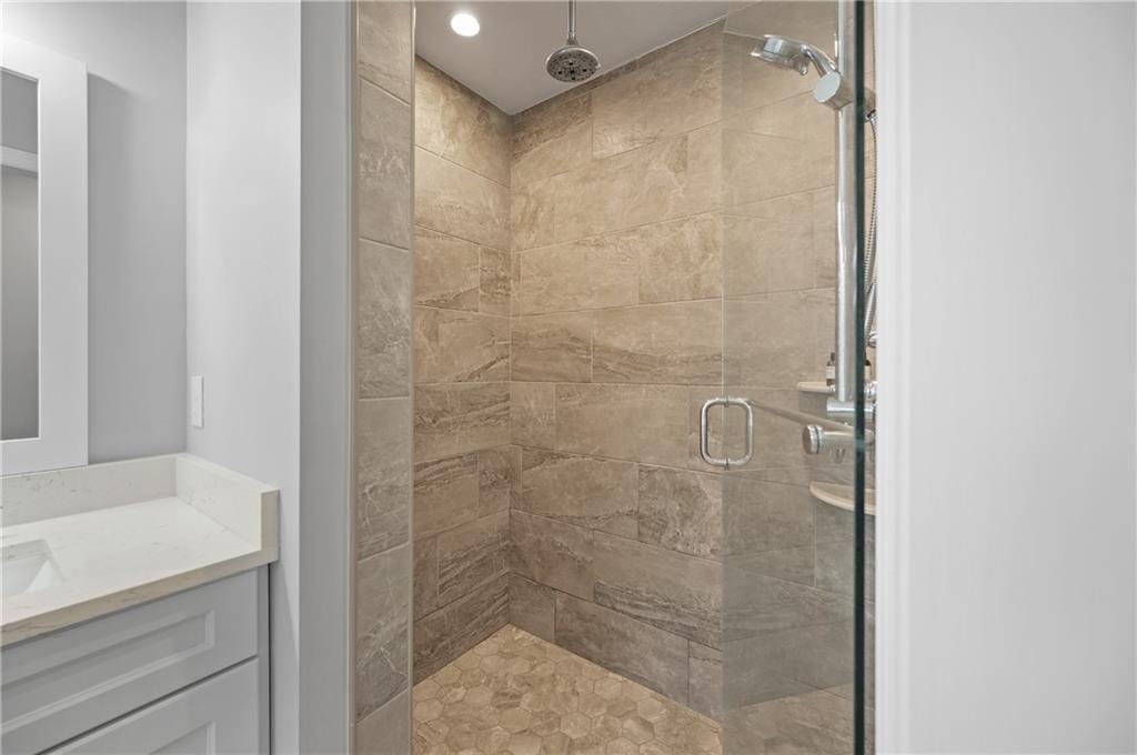9807 Three Degree Road Allison Park, PA 15101 - Photo 29 of 48 The oversized shower has a ceramic surround with a rainfall shower head in addition to the handheld.