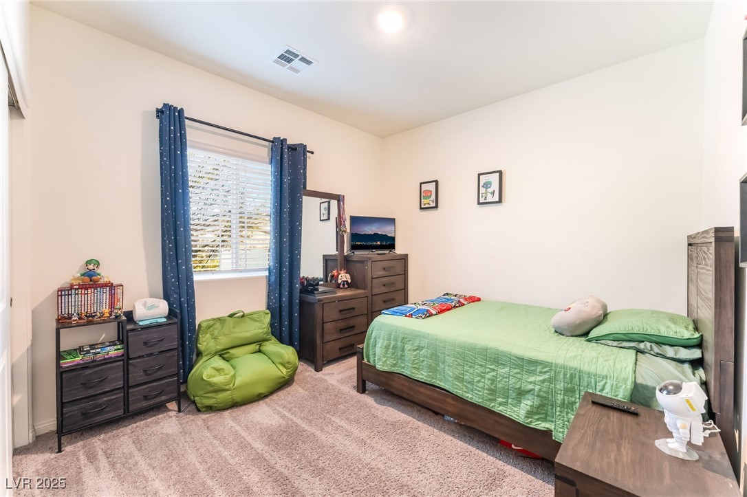 10947 Artisan Ranch Avenue Las Vegas, NV 89166 - Photo 24 of 39 View of carpeted bedroom
