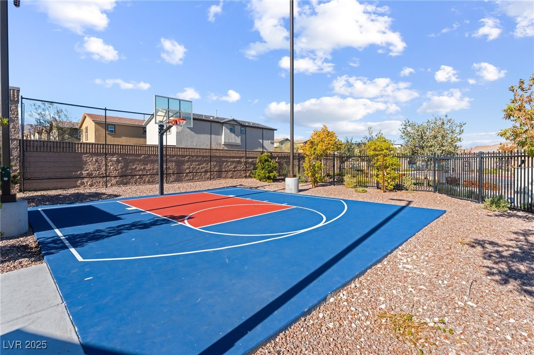 10947 Artisan Ranch Avenue Las Vegas, NV 89166 - Photo 35 of 39 View of basketball court featuring community basketball court and a residential view