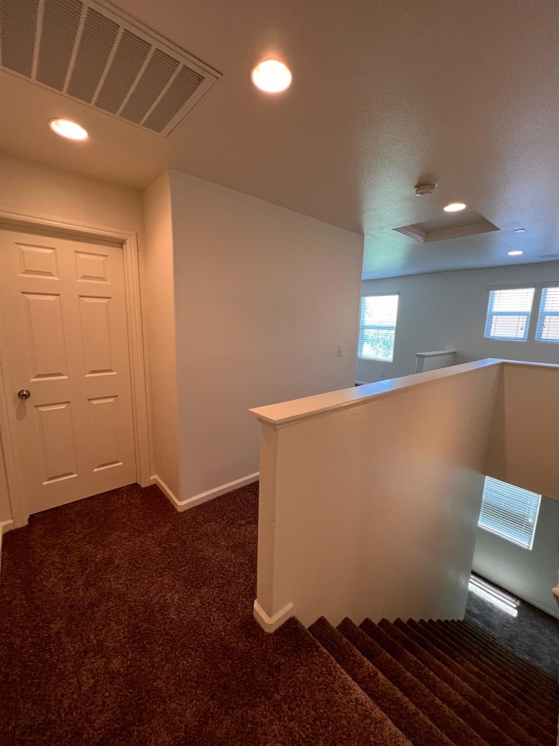 1504 Mosaic Way Clovis, CA 93619 - Photo 14 of 34 a view of an empty room with wooden floor