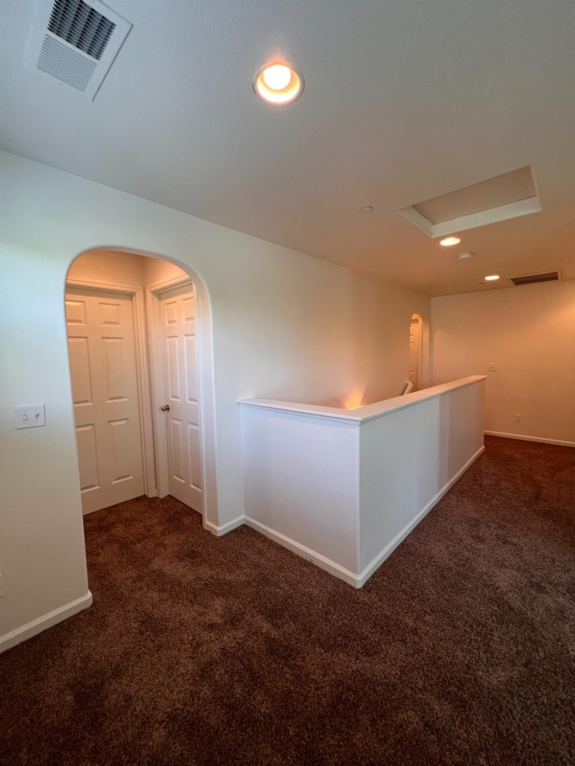 1504 Mosaic Way Clovis, CA 93619 - Photo 15 of 34 wooden floor in an empty room with a window