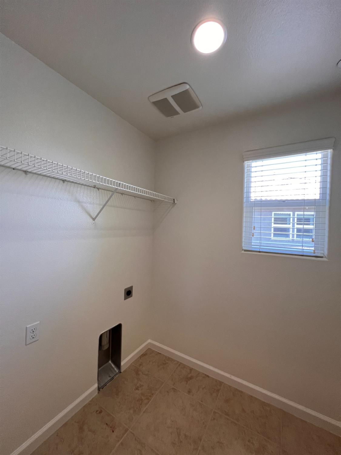 1504 Mosaic Way Clovis, CA 93619 - Photo 18 of 34 an empty room with windows