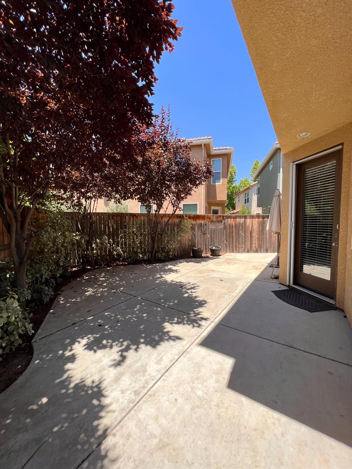 1504 Mosaic Way Clovis, CA 93619 - Photo 32 of 34 a view of a house with a yard