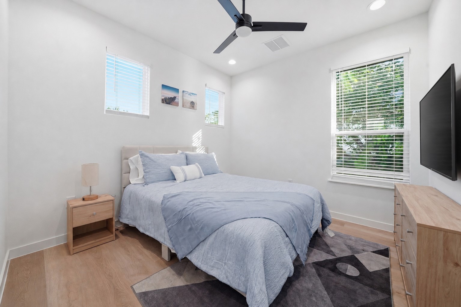 2216 Yellow Jacket Lane, Unit 2 Austin, TX 78741 - Photo 14 of 25 a spacious bedroom with a bed and a window