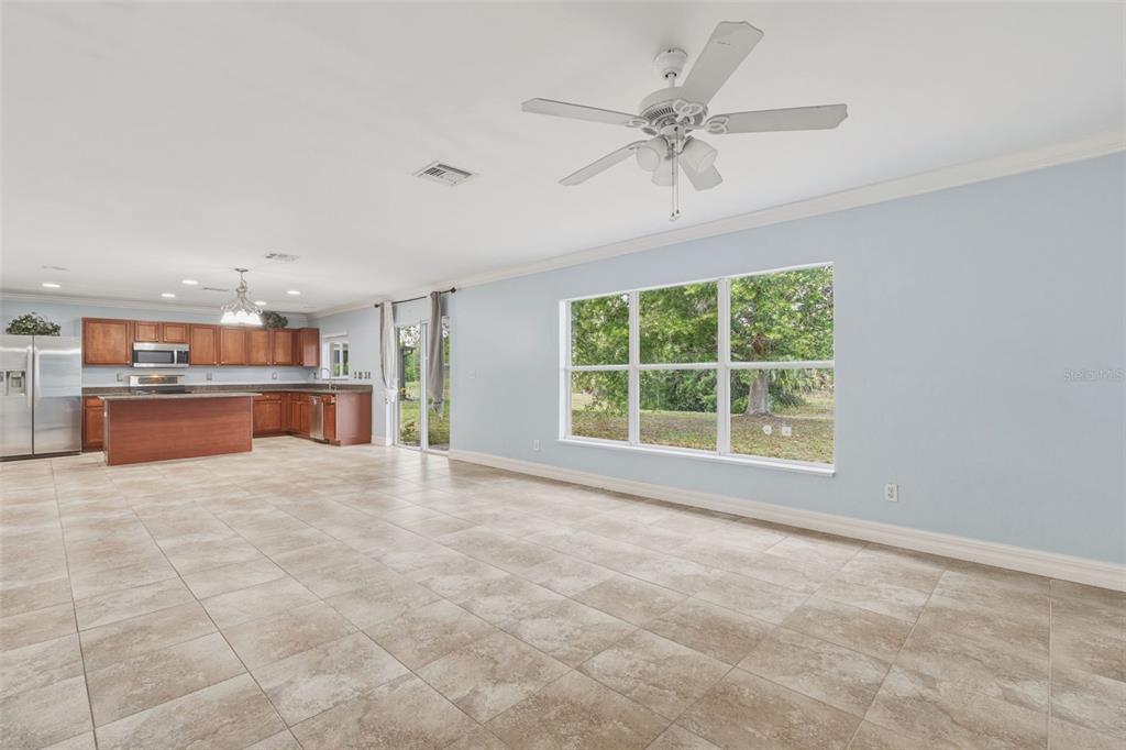 25134 Palisade Road Punta Gorda, FL 33983 - Photo 15 of 58 a view of a kitchen with a sink and a window