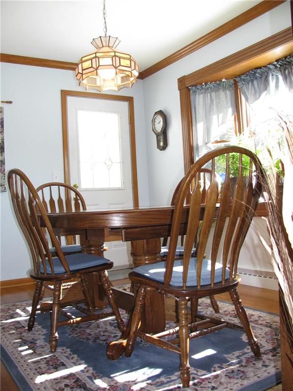 809 East Jamestown Road Jamestown, PA 16134 - Photo 9 of 25 D.R. WITH HARDWOOD FLOORS. EXIT TO SIDE PORCH/BAY WINDOW