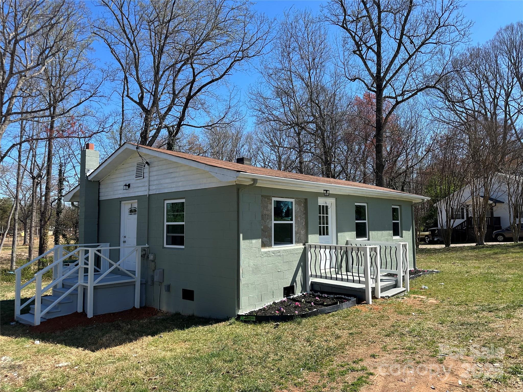 209 Brookview Road Statesville, NC 28625 - Photo 14 of 14 a view of a house with a yard in the background