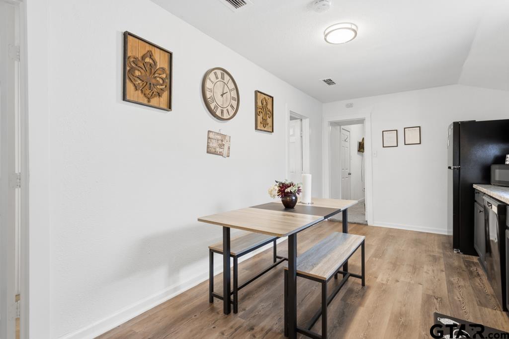10124 County Road 280 Tyler, TX 75702 - Photo 18 of 47 a view of a room with furniture and wooden floor
