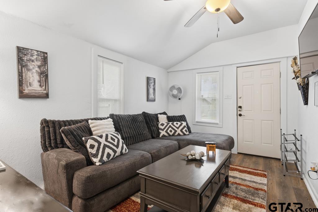10124 County Road 280 Tyler, TX 75702 - Photo 28 of 47 a living room with furniture and a wooden floor