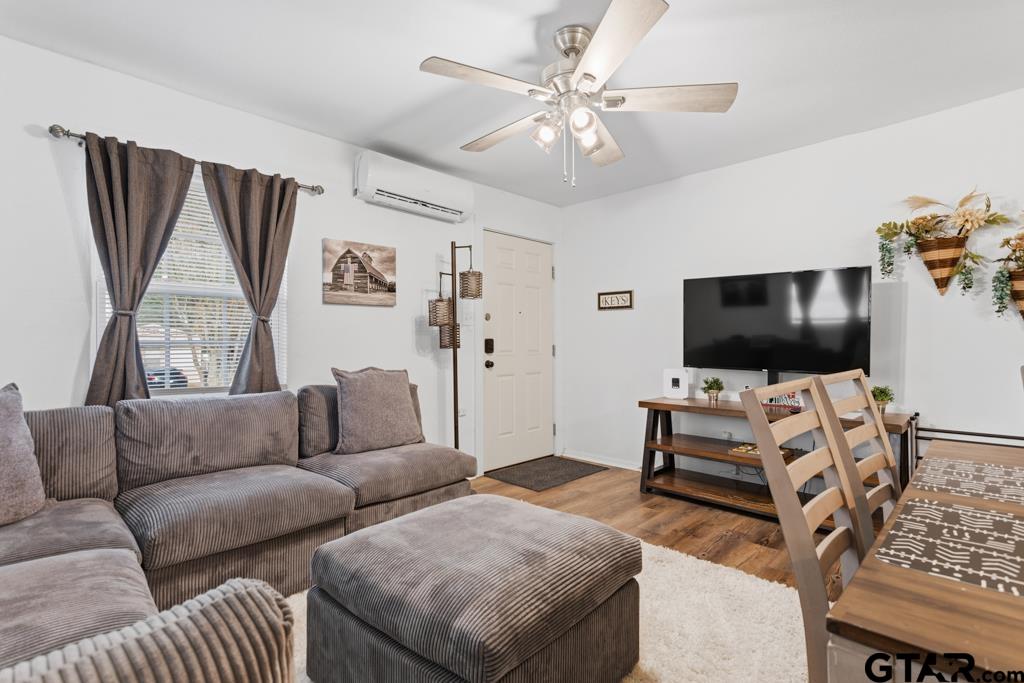 10124 County Road 280 Tyler, TX 75702 - Photo 37 of 47 a living room with furniture and a flat screen tv