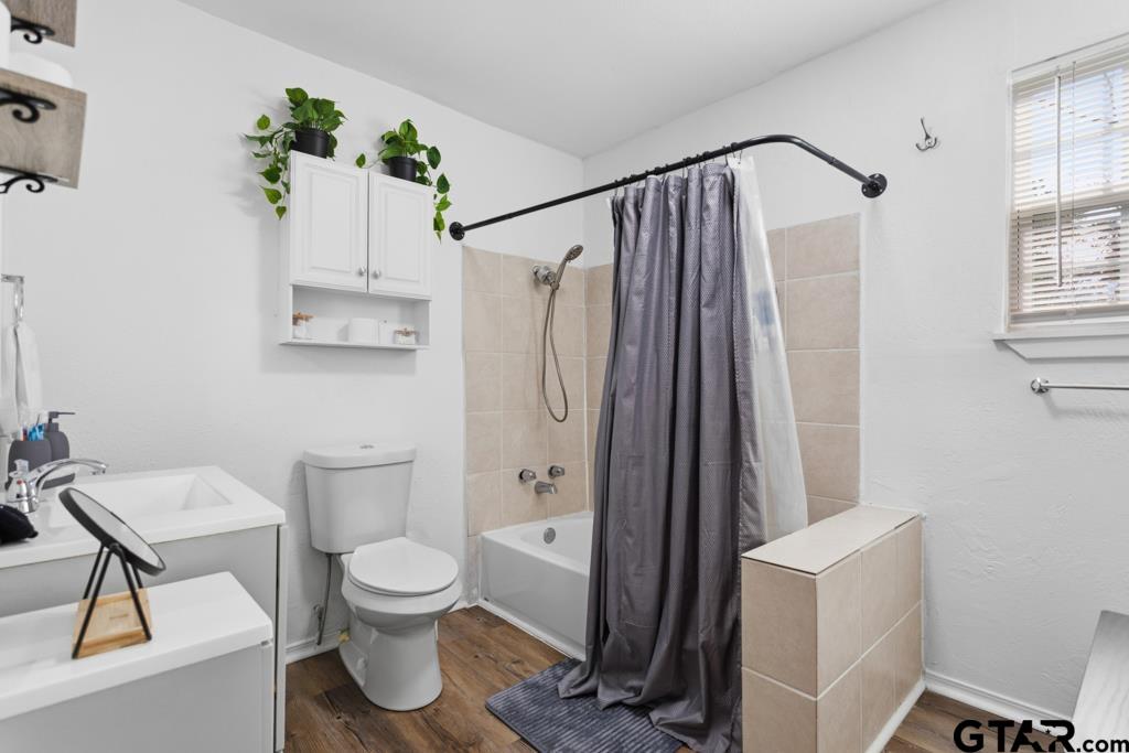 10124 County Road 280 Tyler, TX 75702 - Photo 43 of 47 a bathroom with a toilet and a shower