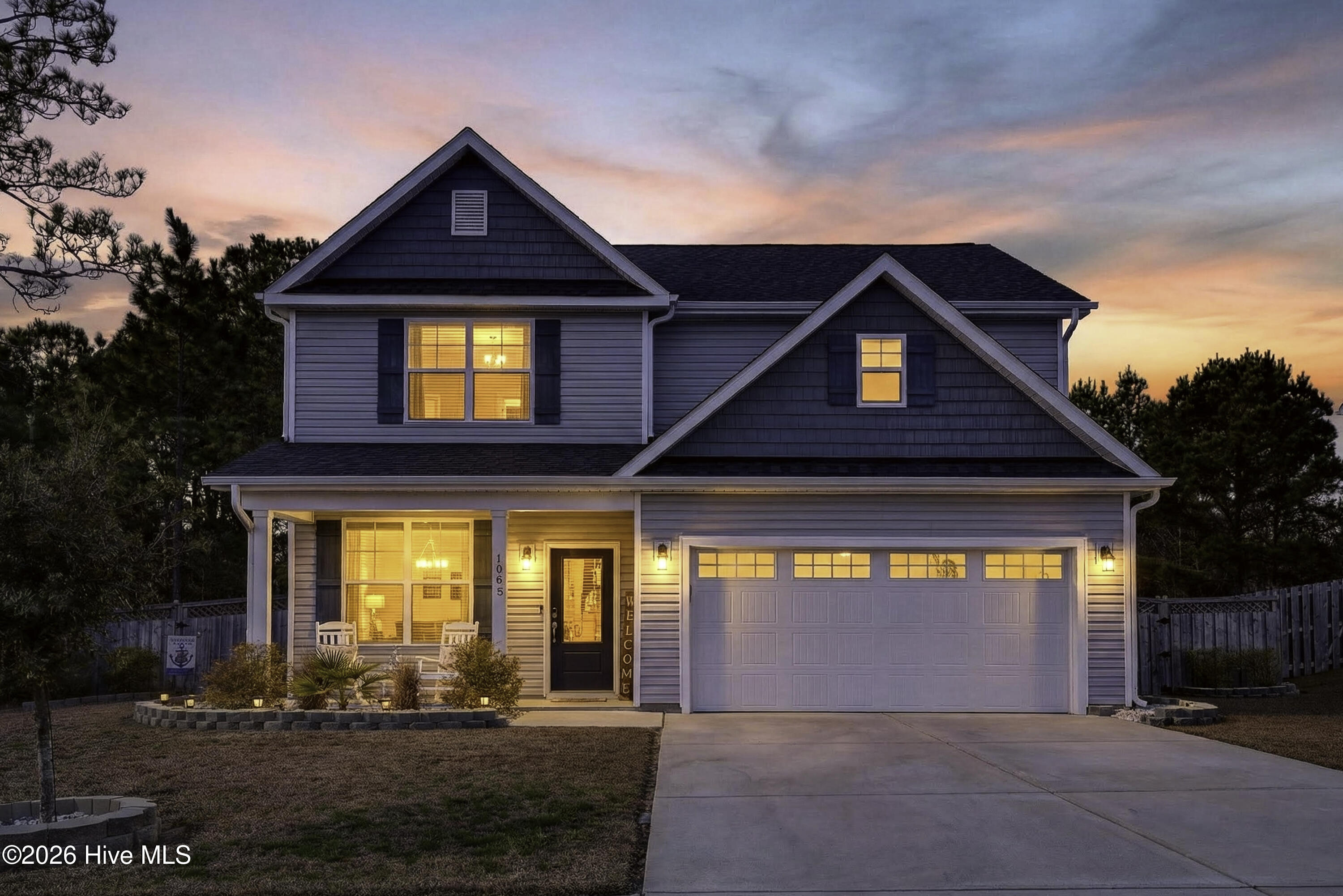 1003 Terraces Lane Hampstead, NC 28443 - Photo 1 of 53 1003TerracesLane-2_Twilight_01