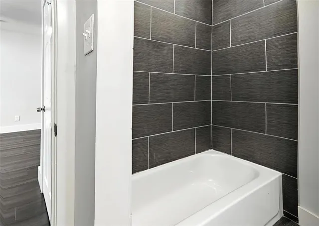 a bathroom with a bathtub