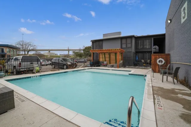 a kitchen with a table and chairs
