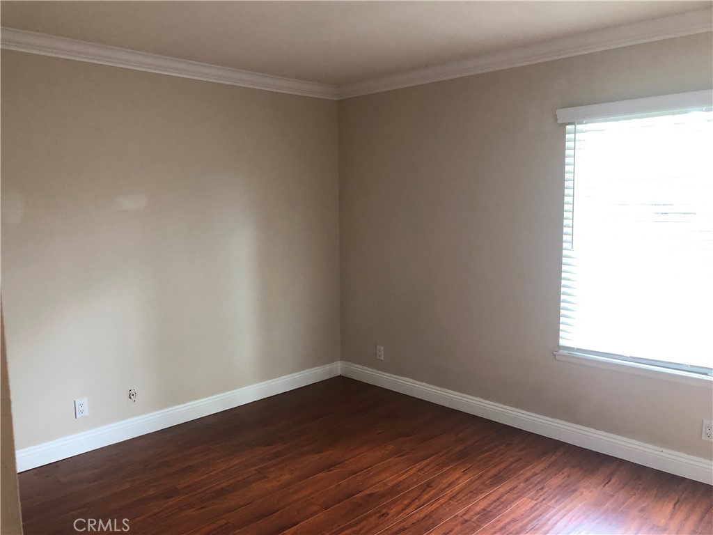 65 Orchard Irvine, CA 92618 - Photo 11 of 21 wooden floor in an empty room with a window