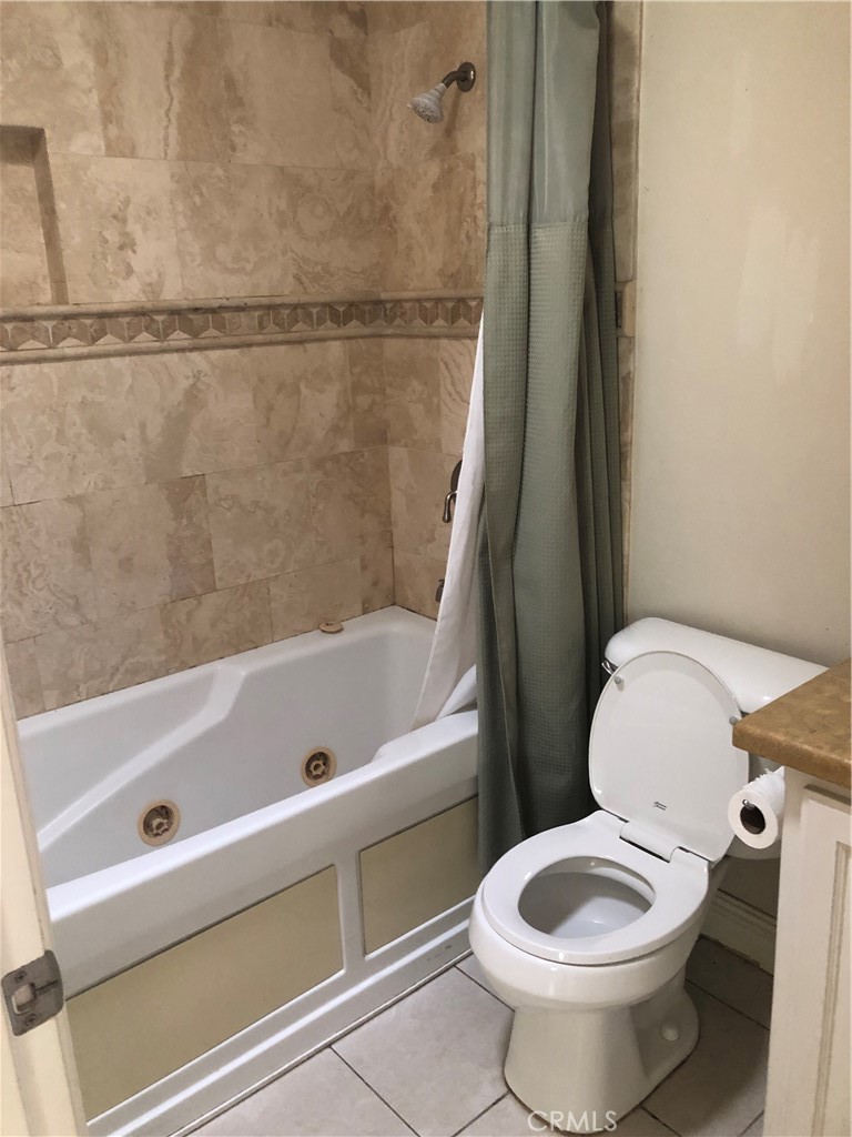 65 Orchard Irvine, CA 92618 - Photo 13 of 21 a bathroom with a toilet and a shower