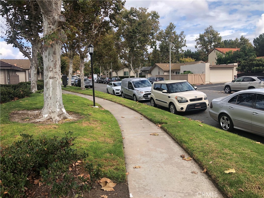 65 Orchard Irvine, CA 92618 - Photo 18 of 21 a view of a yard with cars