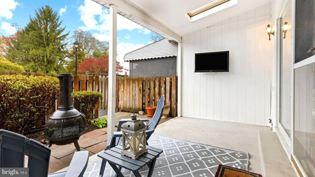 a view of a two chair in the patio