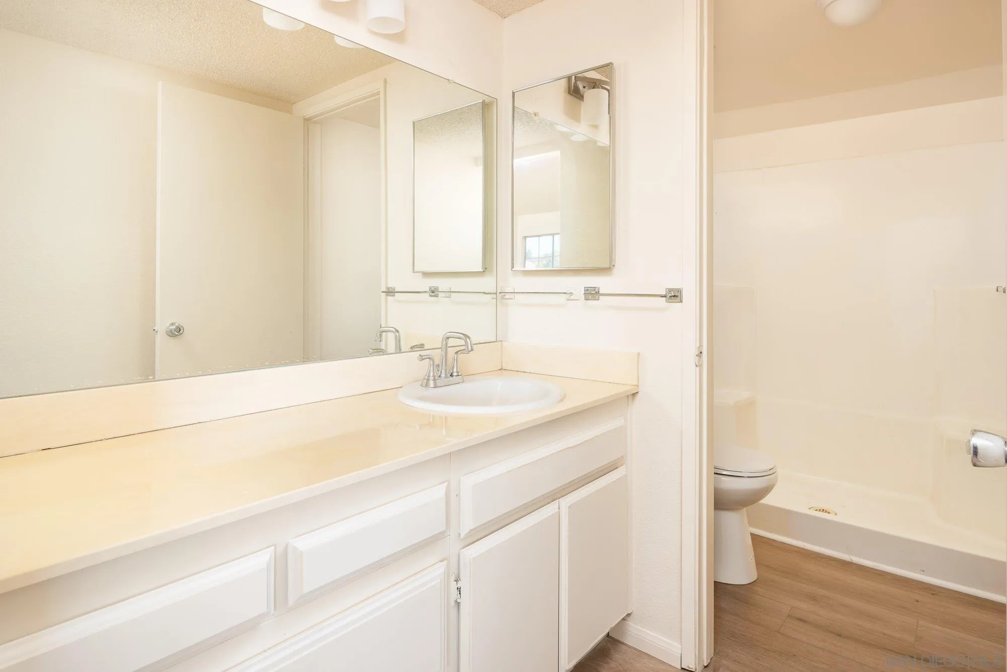 467 Nantucket Glen Escondido, CA 92027 - Photo 16 of 26 a bathroom with a sink and a mirror