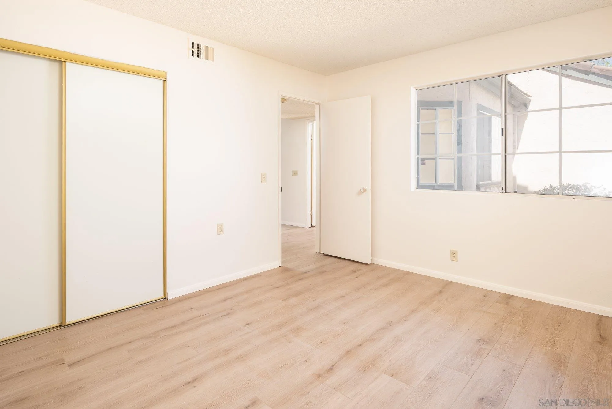 467 Nantucket Glen Escondido, CA 92027 - Photo 19 of 26 a view of an empty room with a window