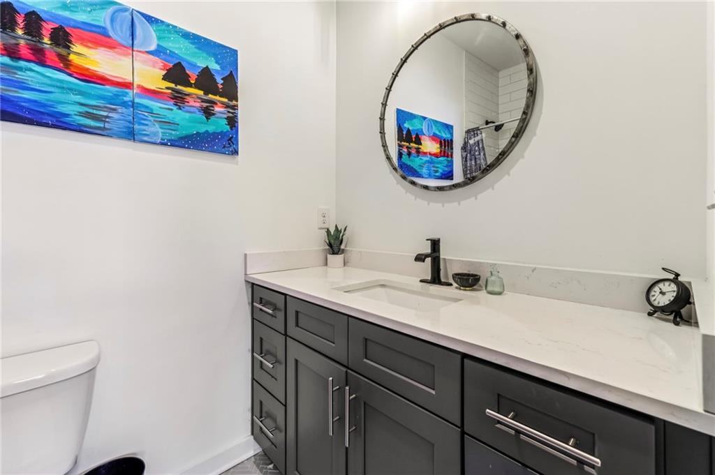 2336 Mason Drive Atlanta, GA 30316 - Photo 15 of 19 a bathroom with a sink and a mirror
